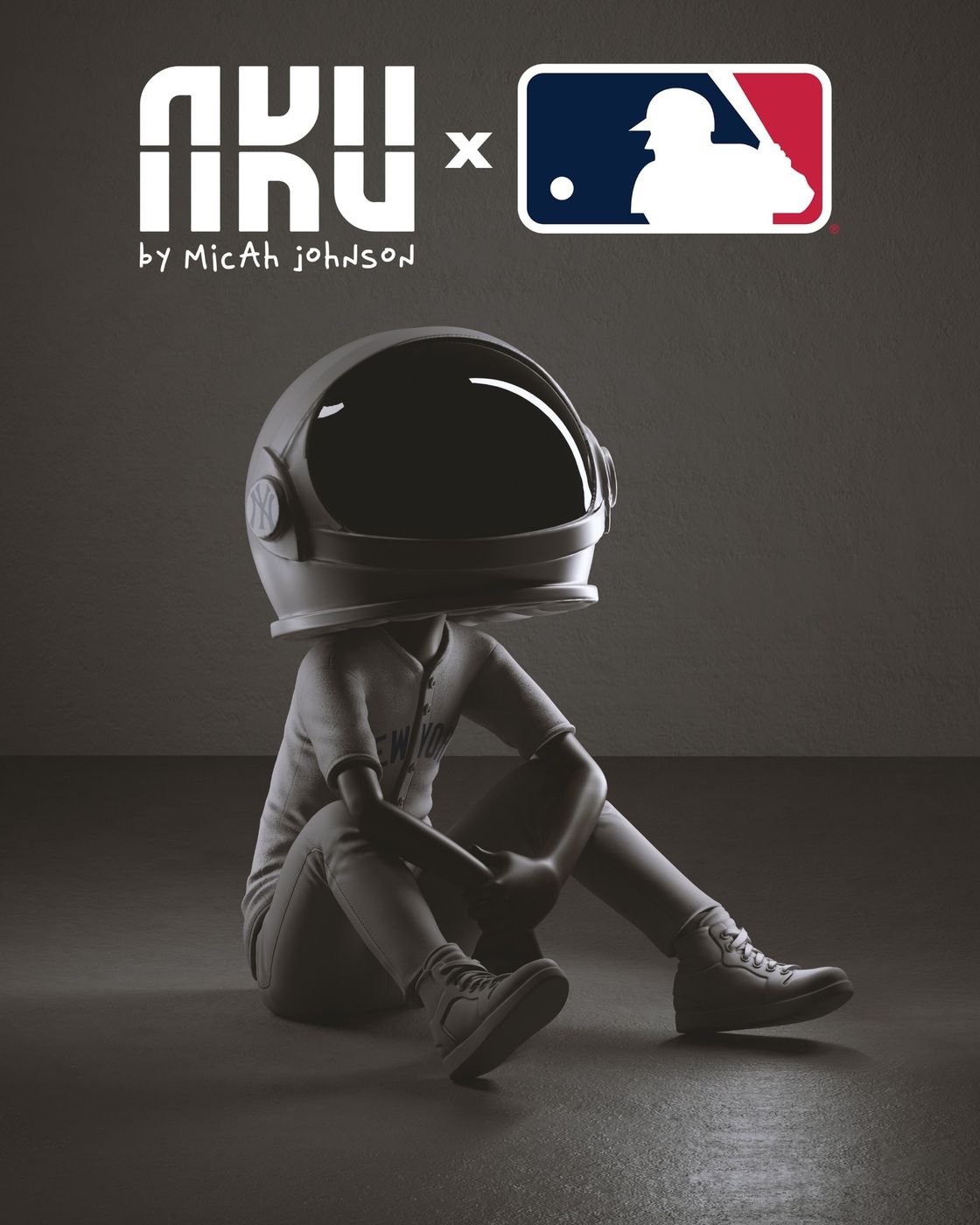 AKU × MLB — Aku in a black suit and helmet sitting on the floor against a grey backdrop